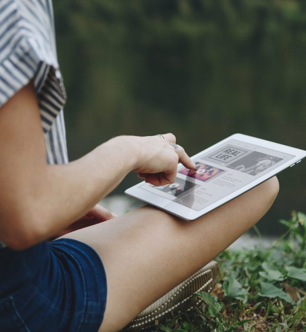 woman-alone-nature-using-digital-tablet-with-entertainment-application-screen-internet-c